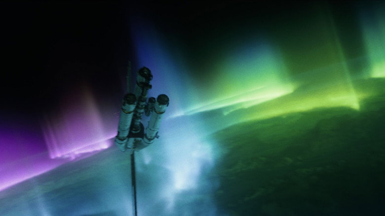 Movie still from Project Hail Mary featuring the Hail Mary over the aurora borealis lights of the planet Adrian.